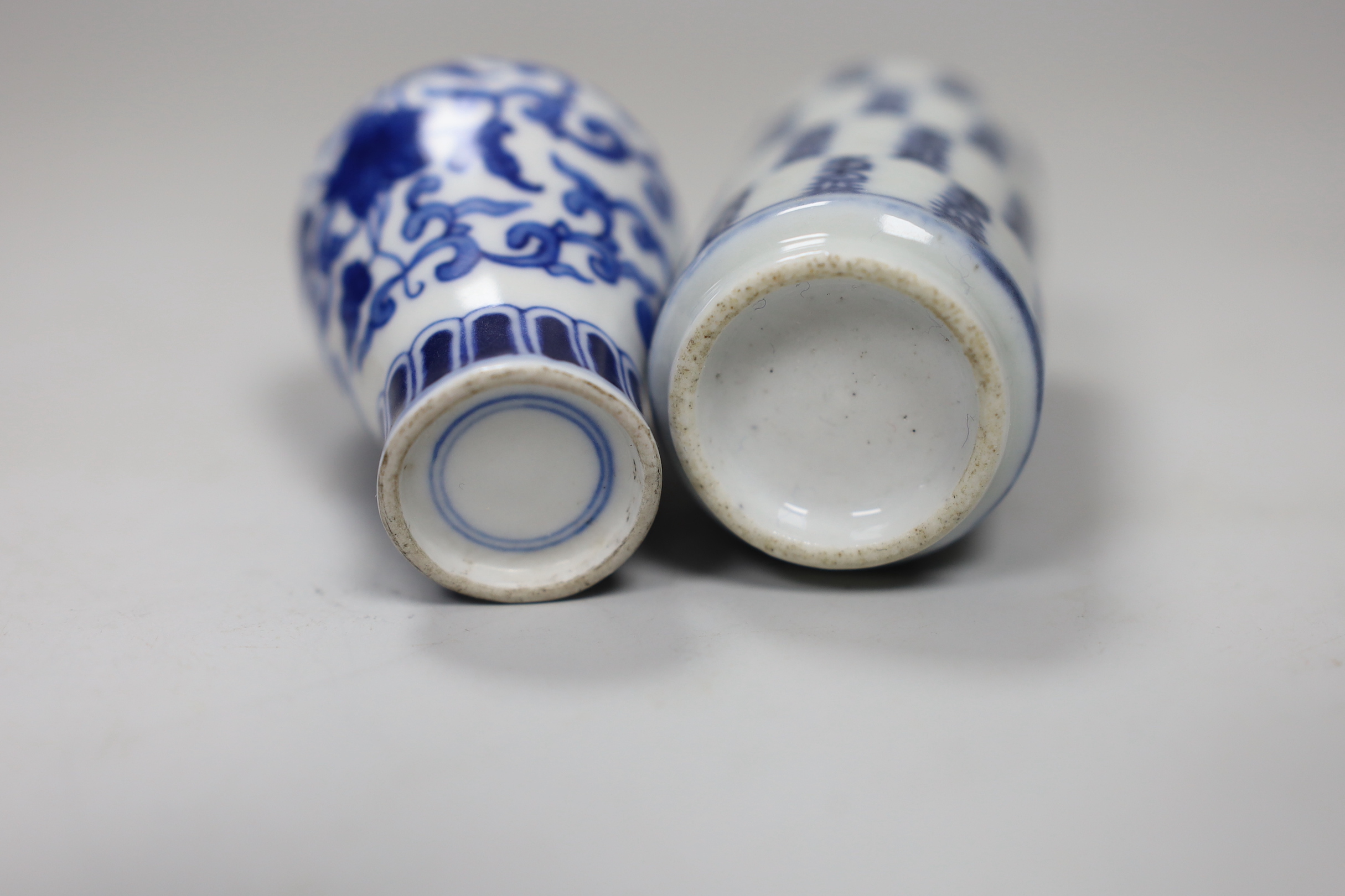 Two Chinese blue and white snuff bottles, tallest 9cm high